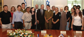 Prime Minister Ehud Olmert (center) and Minister of Education Yuli Tamir (third from right) meeting with students, including Shifa Mahamid (fourth from right), who represented winners of the "Young Scientists in Israel" competition over the years